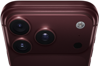 iPhone 18 Pro Max, finition bordeaux (rouge foncé), face arrière, système caméra Pro Fusion au sommet, 3 objectifs, lamelles d’ouverture variable partiellement fermées, flash, micro et scanner LiDAR, face supérieure, antenne cellulaire, côtés plats, bords arrondis